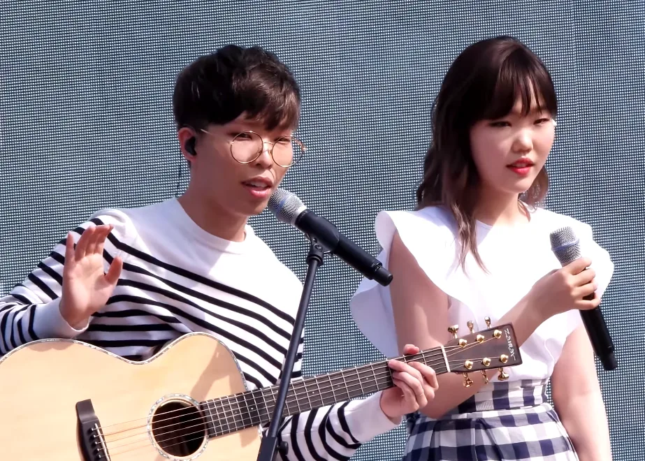 The Space Between Two Voices: How AKMU Writes Dialogue Into Pop