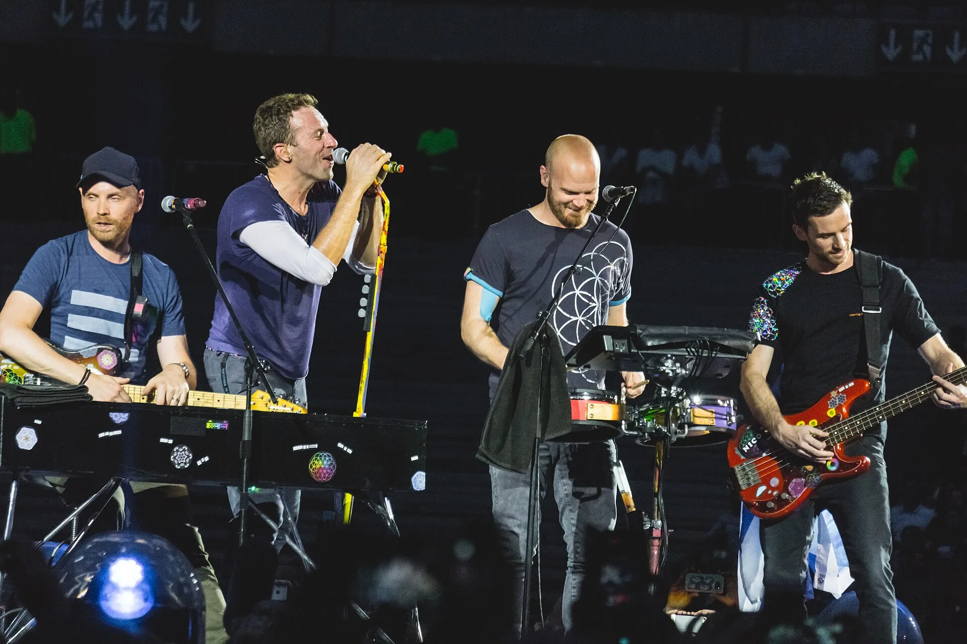 Coldplay in Five Movements: How Small Feelings Fill Stadiums