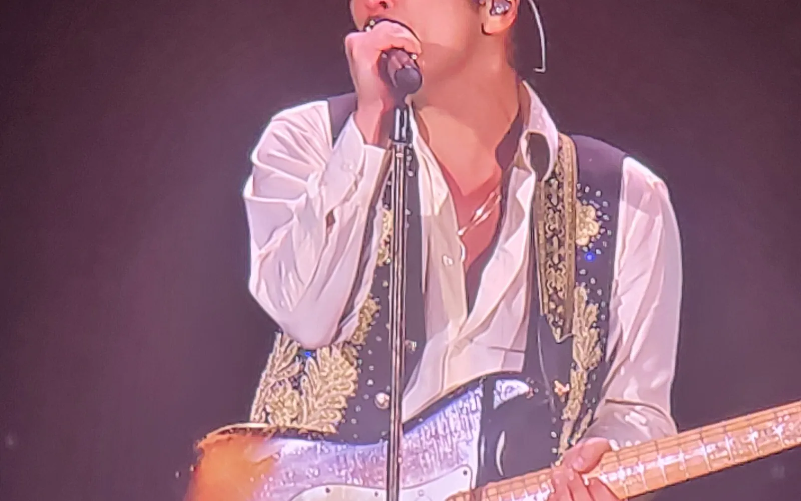 Bruno Mars performing on The Romantic Tour in 2026